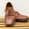 Stylish brown leather shoes with vintage charm, perfect for casual or semi-formal wear.