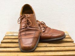 Stylish brown leather shoes with vintage charm, perfect for casual or semi-formal wear.