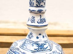 Elegant blue and white ceramic vase with intricate floral patterns, perfect for any decor.