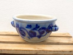 Elegant blue ceramic pot with handles, featuring intricate patterns for decorative and practical use.