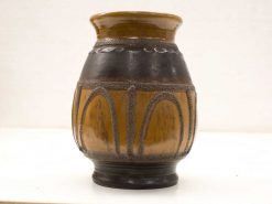 Elegant brown ceramic vase with unique geometric patterns and rich color gradation.