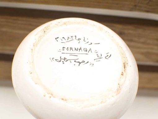 Handcrafted ceramic vase featuring SORNAGA inscription, perfect for collectors and decor enthusiasts.