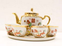 Elegant Chinese porcelain tea set with dragon motifs, perfect for special occasions and collectors.