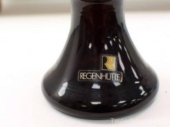 Elegant Regenhütte glass vase with dark hue and striking gold logo. Perfect for collectors.