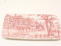 Charming decorative plate depicting 18th-century English countryside scene with horses and carriage.