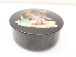 Elegant black round storage box featuring a painted duck, perfect for jewelry and decor.