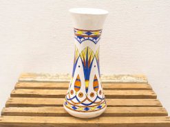 Colorful geometric decorative vase perfect for vintage collections and elegant home decor.