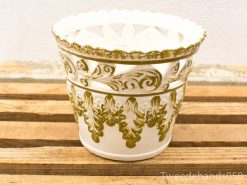 Elegant white pot with gold accents, perfect for floral displays or as a decorative piece.