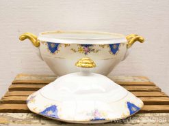 Elegant vintage porcelain serving bowl with floral design and gold accents. Perfect for special occasions.