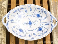 Elegant blue and white porcelain serving platter with floral designs for special occasions.