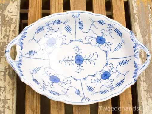 Elegant blue and white porcelain serving platter with floral designs for special occasions.