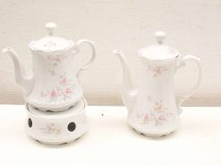 Elegant porcelain teapots with floral patterns, perfect for stylish tea service and special occasions.