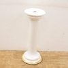 Elegant white porcelain pedestal with gold trim, perfect for displaying floral arrangements or decor.