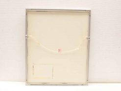 Back of a modern silver frame with beige backing and hanging string attachment.