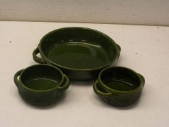 Charming deep green ceramic dish set, perfect for serving salads and pasta at any occasion.