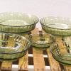 Elegant green glass bowls for versatile dining and stylish kitchen decor. Perfect for any occasion.