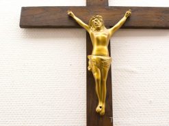 Vintage golden crucifix of Jesus, beautifully crafted, perfect for spiritual reflection and decor.