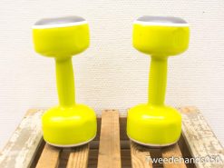 Bright yellow dumbbells for home workouts, combining style with functionality for fitness enthusiasts.