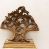 Elegant wooden crown with floral motifs, perfect for architectural or furniture embellishment.