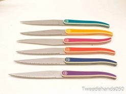 Vibrant, ergonomic knife set in stainless steel, perfect for stylish and functional kitchen use.