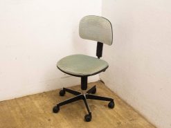 Light green vintage office chair with adjustable backrest for comfort and style.