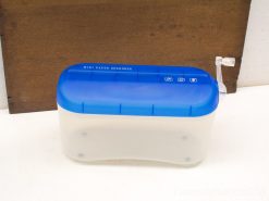 Compact blue mini paper shredder with transparent design, ideal for home or office use.