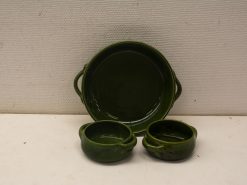 Elegant olive green ceramic dining set with serving plate and matching bowls. Perfect for stylish meals.