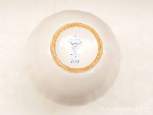 Elegant porcelain bowl with blue crown marking, ideal for collectors and stylish tableware.