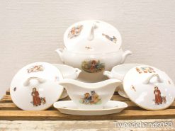 Charming vintage porcelain serving set with playful illustrations and nostalgic themes. Perfect for collectors.