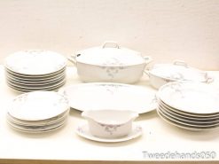 Elegant vintage tableware set with charming floral design for formal dinners and family gatherings.