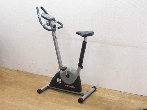 Sleek stationary exercise bike with adjustable seat and handlebars for effective home workouts.