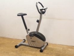 Sleek stationary exercise bike, perfect for indoor cardio workouts at home.