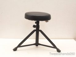 Adjustable modern tripod stool with a comfortable faux leather seat for home and workshop use.