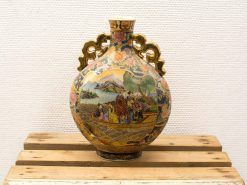 Elegant vintage Chinese vase with intricate designs and vibrant colors in porcelain.