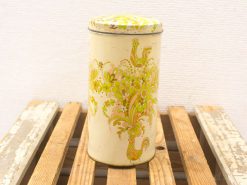 Vintage floral tin container with lid, perfect for decor and collectors.