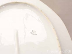 Elegant vintage ceramic dish from Portugal with gold trim, perfect for stylish dining.