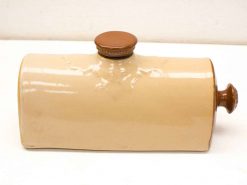 Elegant vintage ceramic flask with brown lid, perfect for decor and practical use.