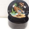 Vintage decorative container featuring a vibrant duck and floral design on a glossy finish.