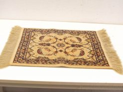 Elegant vintage beige rug with floral pattern and fringed edges, perfect for any decor.