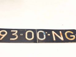 Vintage license plate 93-00 NG with retro charm, perfect for classic car enthusiasts.