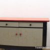 Vintage gray and red sideboard with unique charm and stylish detailing for any room.