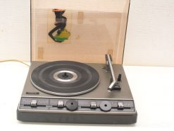 Vintage turntable with sleek design, retro illustration, and elegant features for audiophiles.