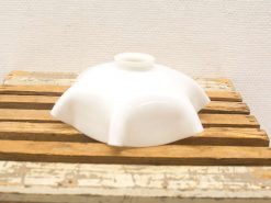 Elegant scalloped white porcelain dish, perfect for decor or as a candle holder.