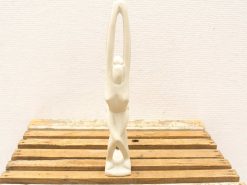 Elegant white female figure sculpture, showcasing beauty and serenity in minimalist design.