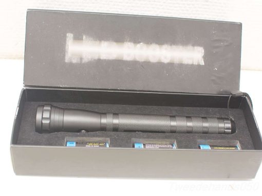 Sleek and durable flashlight in luxury packaging, perfect for outdoor adventures and emergencies.