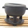 High-quality vintage black cooking pot, durable cast iron, perfect for hearty meals.