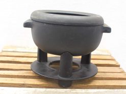 High-quality vintage black cooking pot, durable cast iron, perfect for hearty meals.