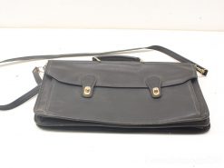 Sleek black leather briefcase with gold clasps, perfect for professionals and business essentials.