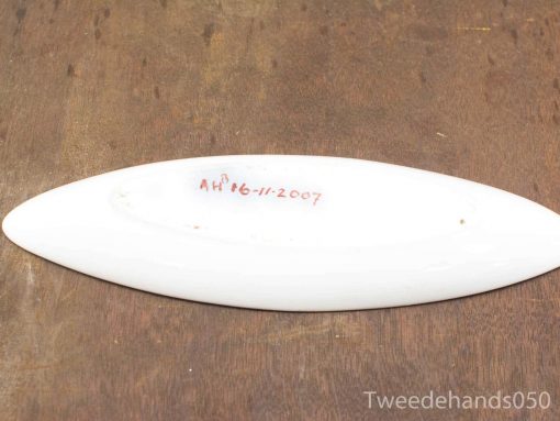 Elegant white ceramic dish with handwritten date AH 16-11-2007 for decor or use.