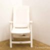 White lounge chair for serene relaxation in outdoor spaces. Perfect for comfort and style.